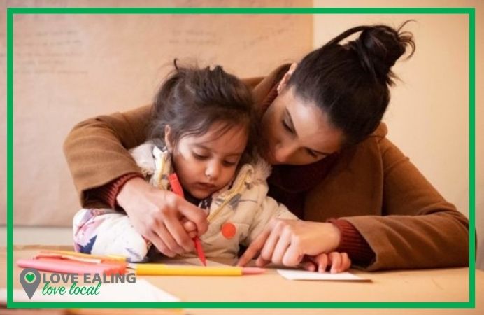 Mother and daughter enjoying an art activity together