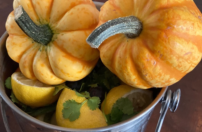 Haloween vegtables in a bucket