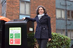 Councillor Deirdre Costigan at the new communal food waste bin at the Copley Close estate