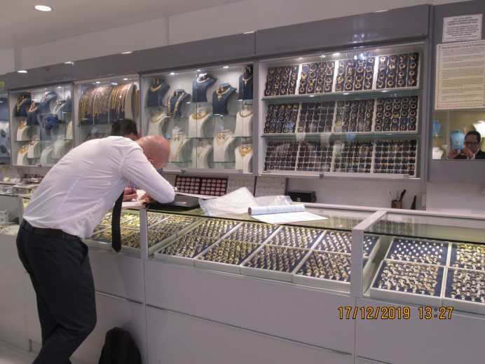 Ealing's Trading Standard officers visiting the jewellers