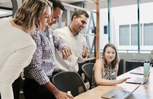 Group of people around a desk