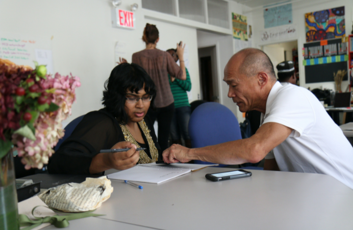 A woman and a man studying