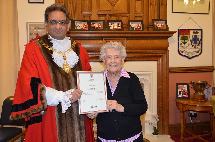 Mayor of Ealing presenting certificate to Beryl Carr in the Mayor's office