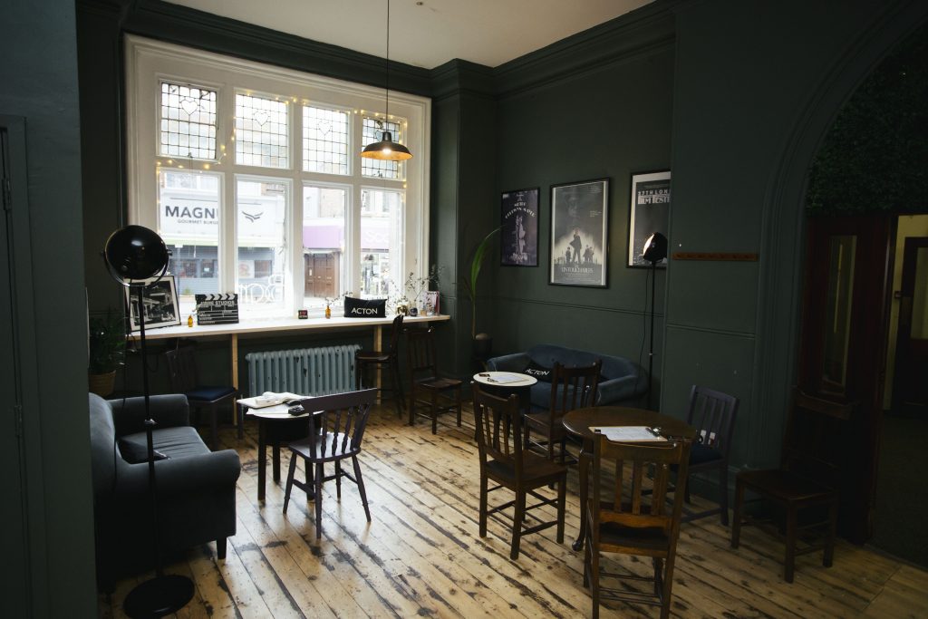 Chairs and tables in a cafe seating area