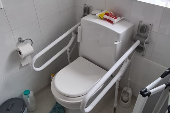 New Clos-o-mat toilet with arms to support the user