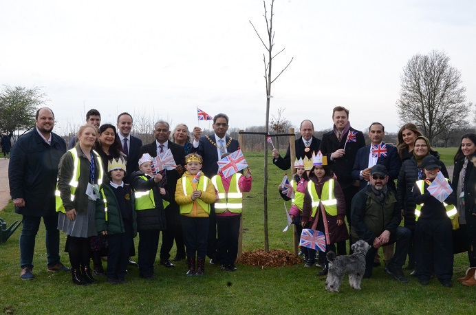 Mayor, councillors, children planting tree