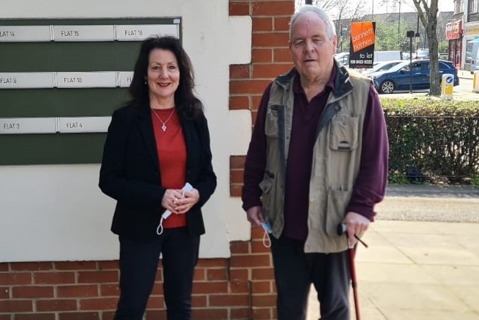 Councillor Lauren Wall with Mr Garrett outside his home