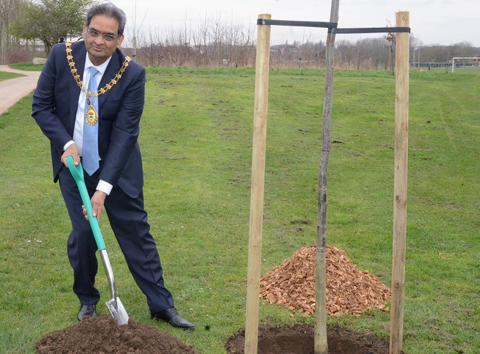 Mayor of Ealing, Cllr Munir Ahmed, planting tree