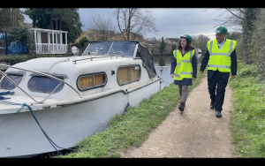 Councillors Wall and Manro walking along the canal next to a boat