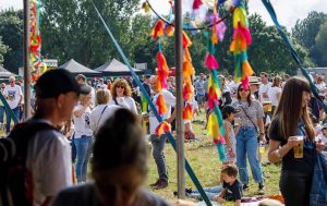 Crowds of people outdoors enjoying the Hanwell Hootie