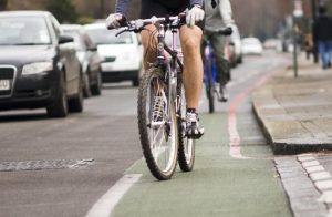 A cyclist rides along a cycle route