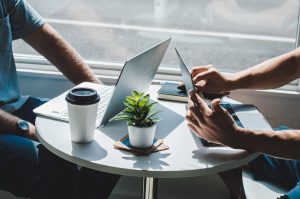 Laptops meeting in coffee shop