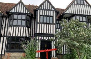 Southall Manor House with red ribbon on door