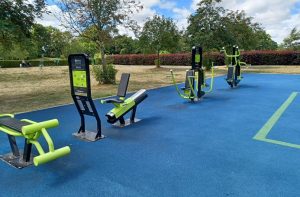 Outdoor gym equipment in park setting