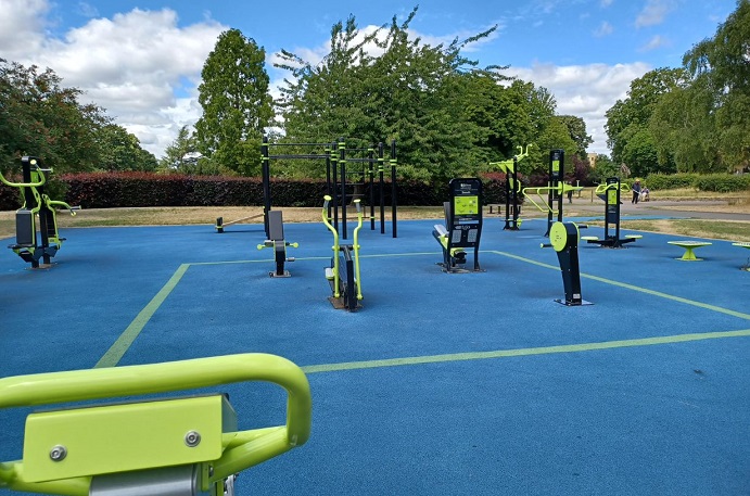 Outdoor gym equipment in park setting