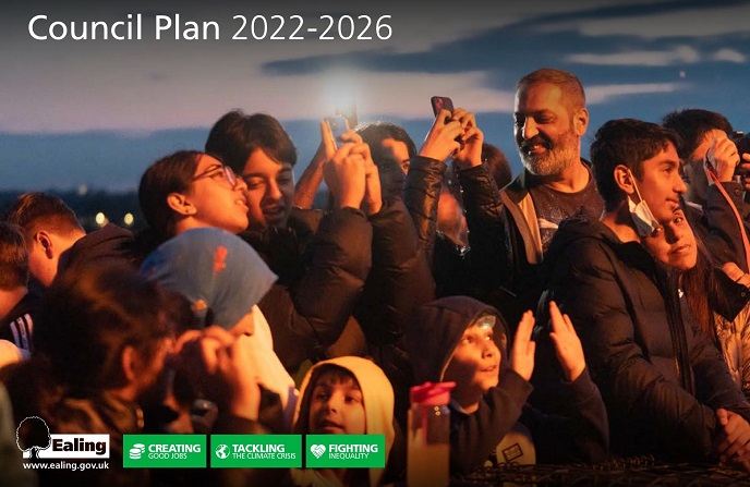 Group of people looking up and right with a night background - front cover of Ealing's Council Plan 2022-2026