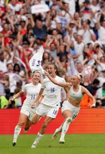 Chloe Kelly celebrates scoring for England