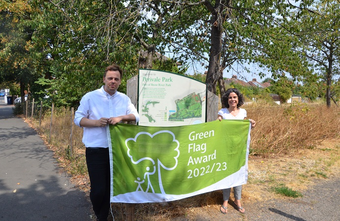 Councillors hold up the Green Flag