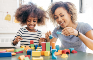 Woman playing with a child