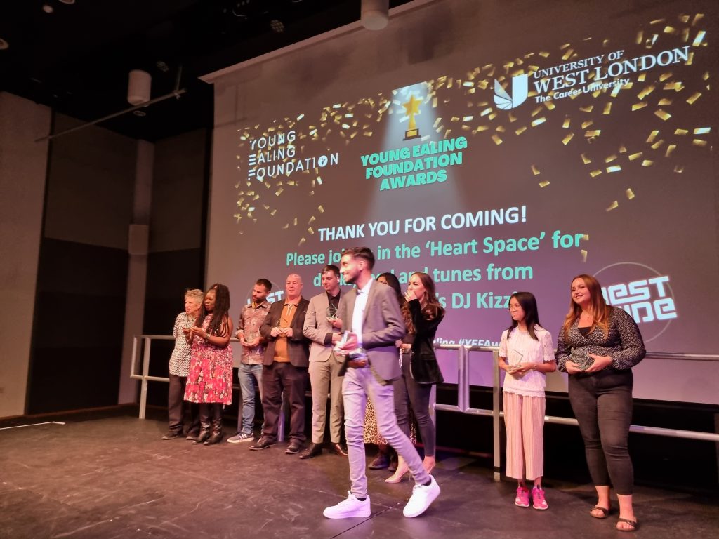 Participants collect trophy at Young Ealing Foundation awards