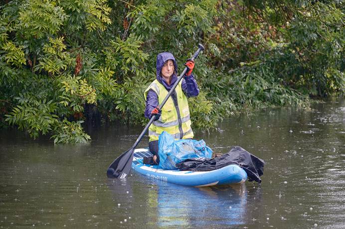 Woman in a canoe on canal