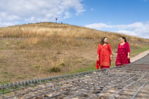 Two women talking to each other at Northala Fields, Northolt