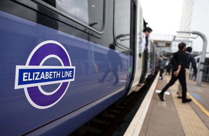 Passengers exit an Elizabeth Line train