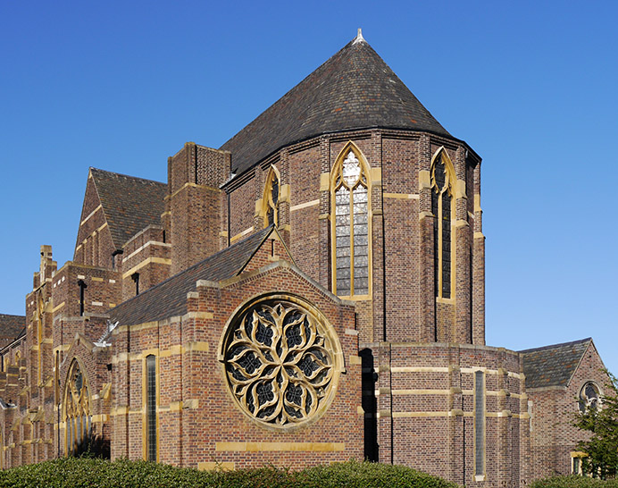 Exterior of a church, viewed from the roadside