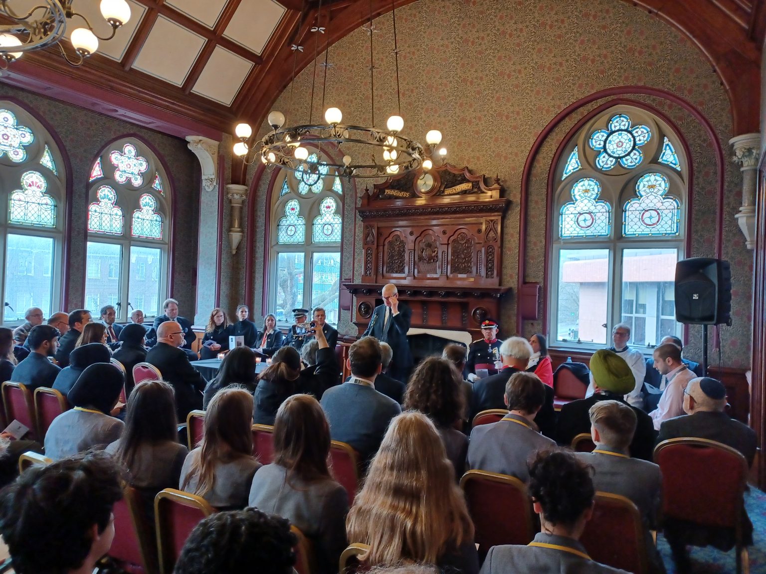 crowd in town hall to mark Holocaust Memorial Day