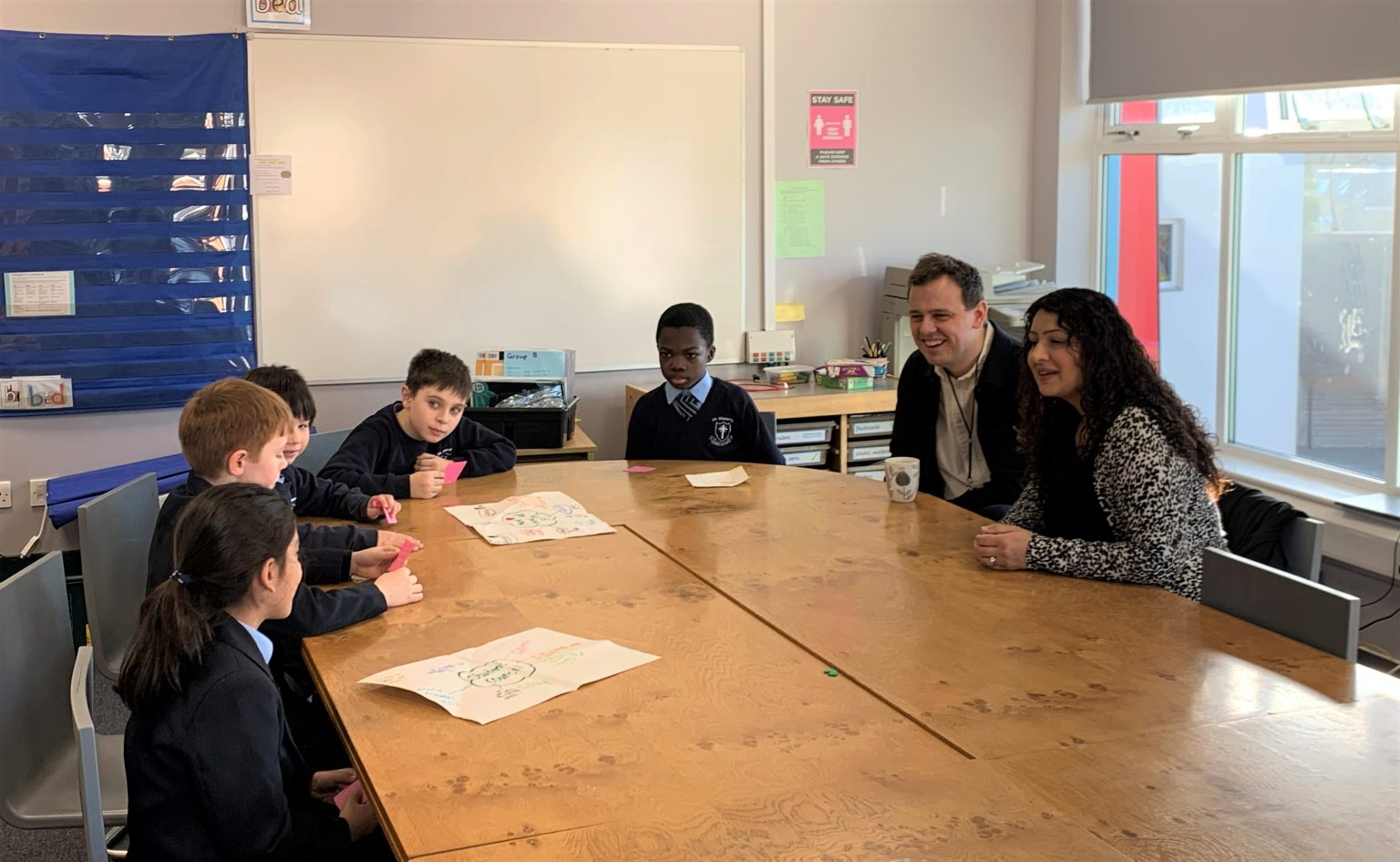 Cllr Peter Mason and Cllr Kamaljit Nagpal at St Vincent's school with students for Children's Mental Health Week