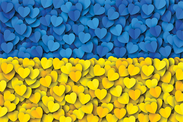 Ukrainian flag made of blue and yellow cut-out paper hearts