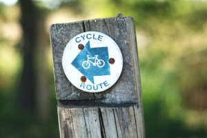 A wooden sign saying cycle route