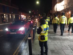 Several council and police officers at work