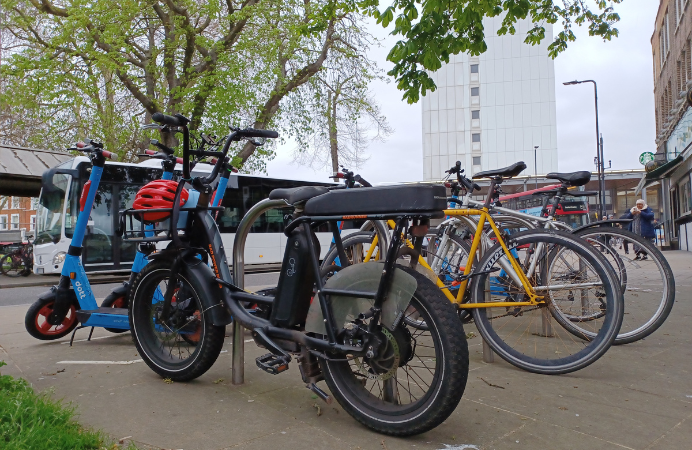 Bicycles and scooters parked in Ealing