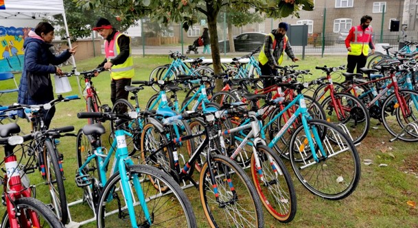 Dr Bike session in Ealing, three mechanics on hand to help residents fix their bikes