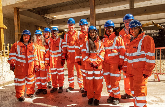 HS2 visit. People in hi vis vests and hard hats