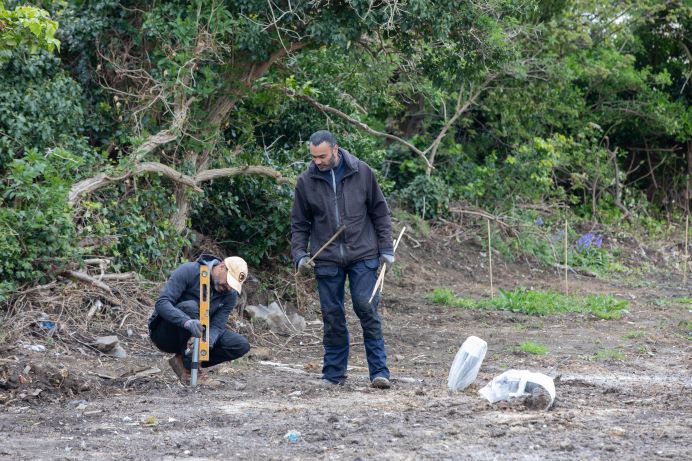 two volunteers working on the ground at Western Road urban garden