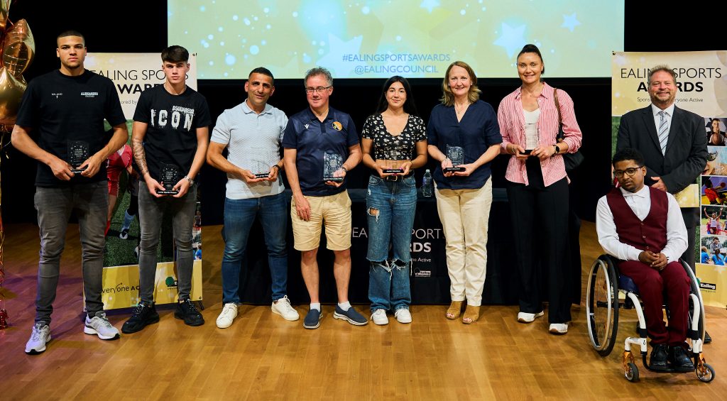 Some winners of the Ealing Sports Awards on stage