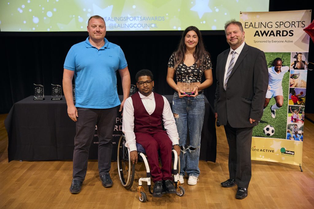 Ellie Mistry picks up her award at the Sports Awards