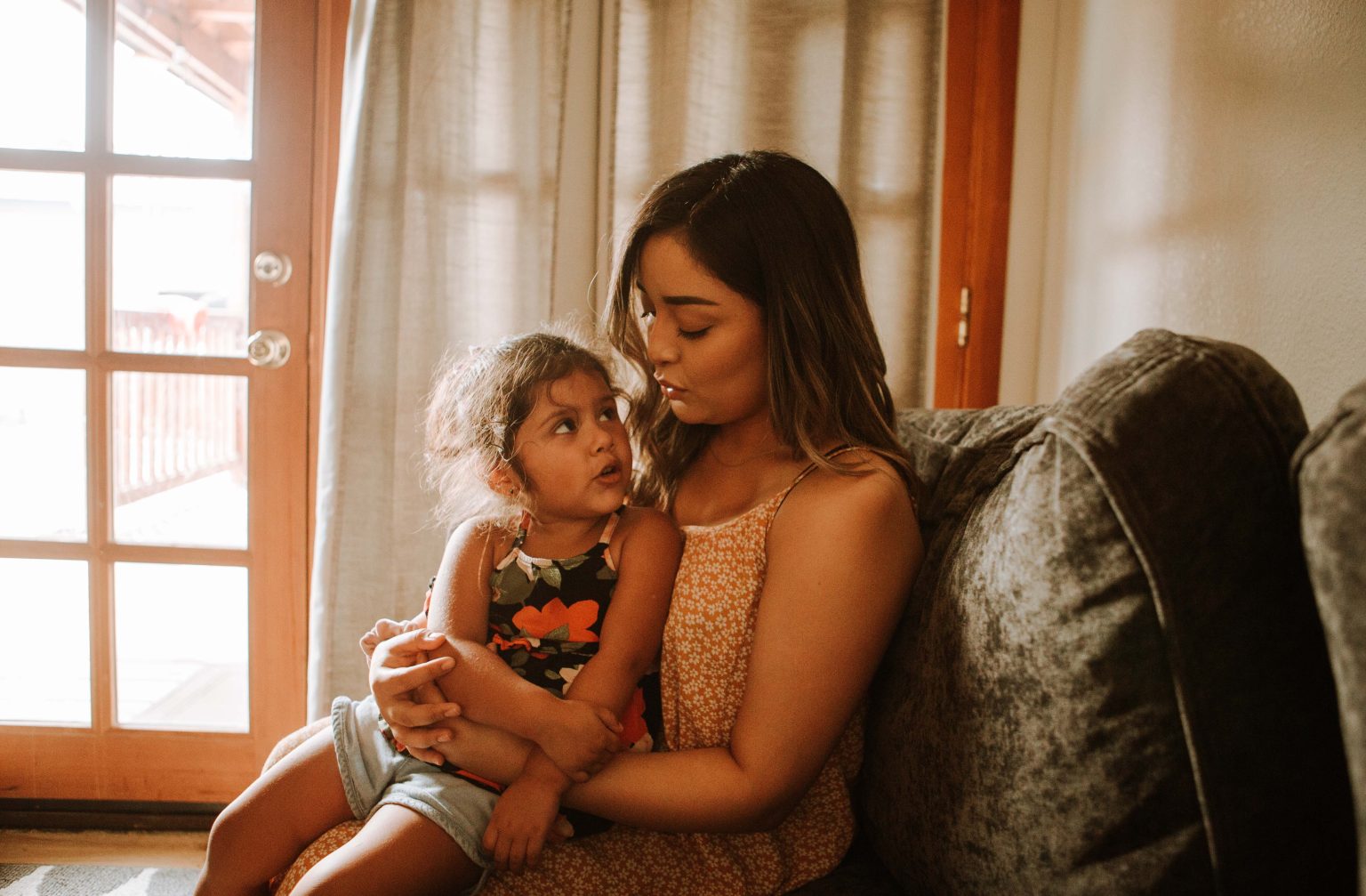 Carer and young girl