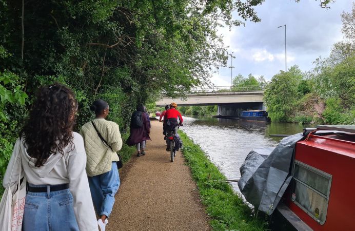 Walkers and cyclists on canal path