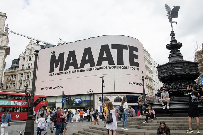 Large sign at Piccadilly Circus reading MAAATE