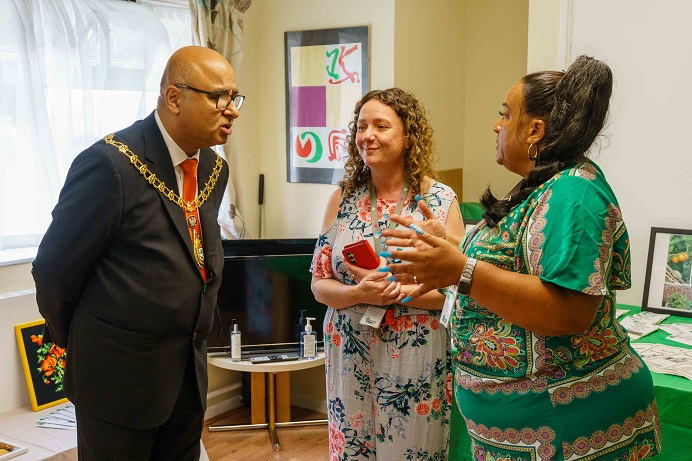 Mayor of Ealing meeting two women