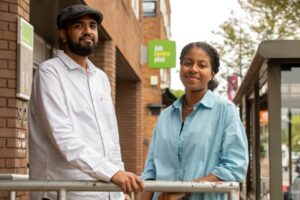 male and female apprentice standing outside Ealing job centre