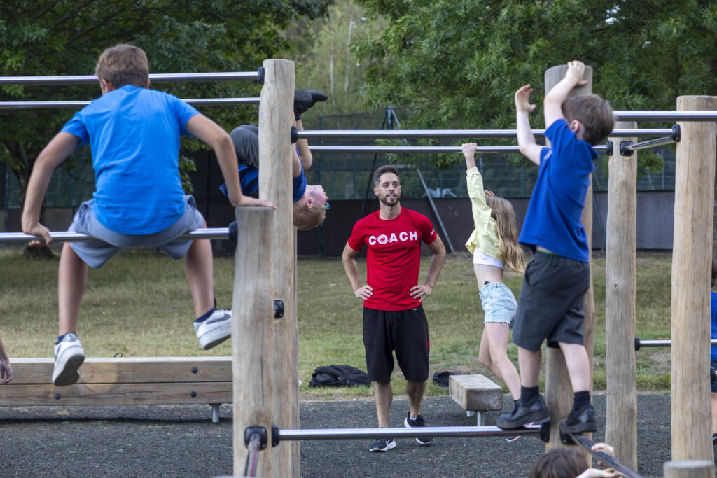 Children and parkour trainers at Lammas Parkour Park