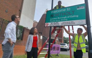 Cllr Costigan and Cllr Mason looking at anti idling signage