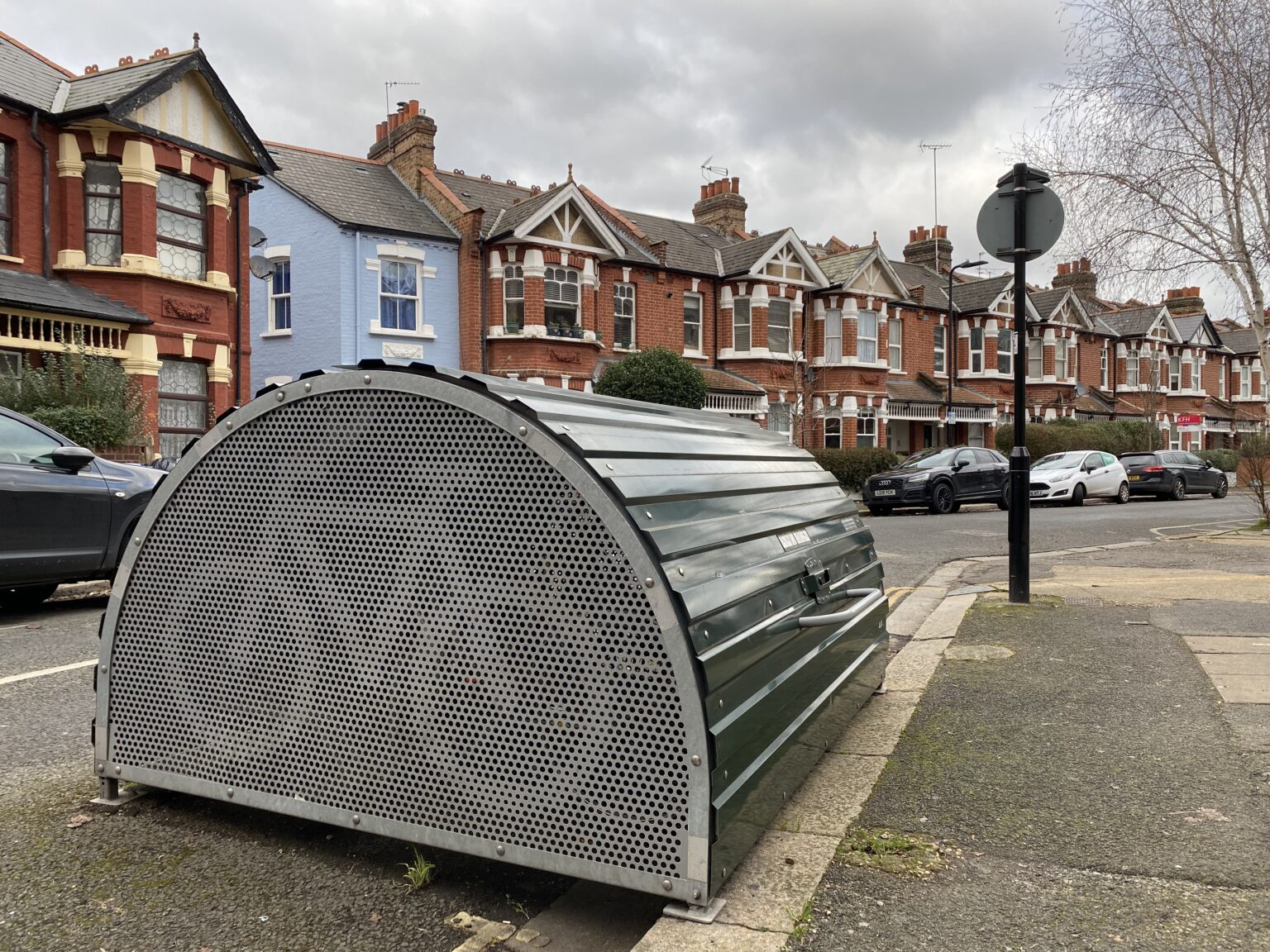 Bike hanger on street in Acton