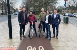 Cllr Mason and Cllr Costigan with cyclists at new cycle lane