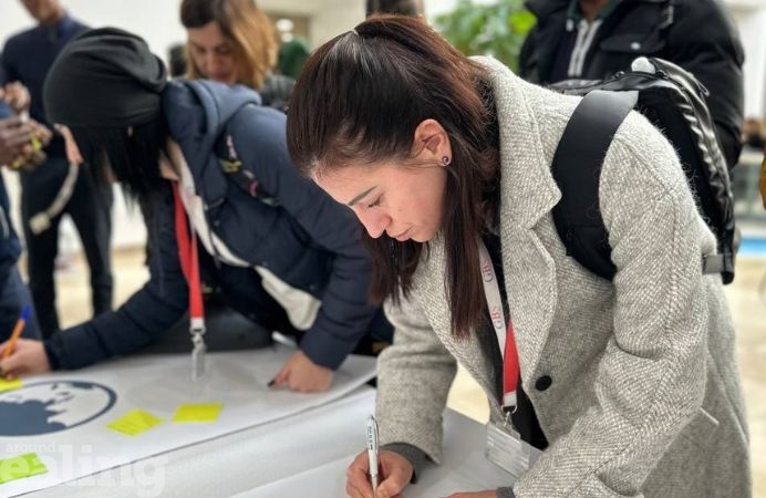 Attendees at Your Voice Your Town meeting share their ideas