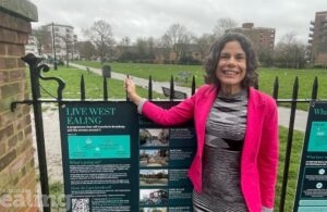 Councillor Costigan with sign for Live West Ealing programme